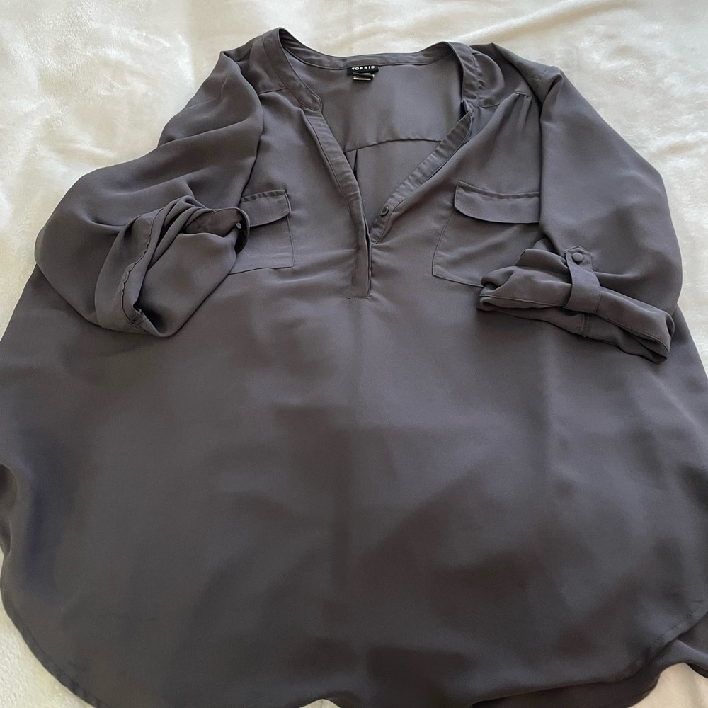 Dark gray top, tulle type material.